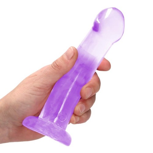 Dildo żelowe RealRock 7 cali z szerszym końcem w kolorze fioletowym - ujęcie z dłonią